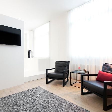 Maison Nationale City Flats & Suites แอนต์เวิร์ป ห้อง รูปภาพ A room at the hotel