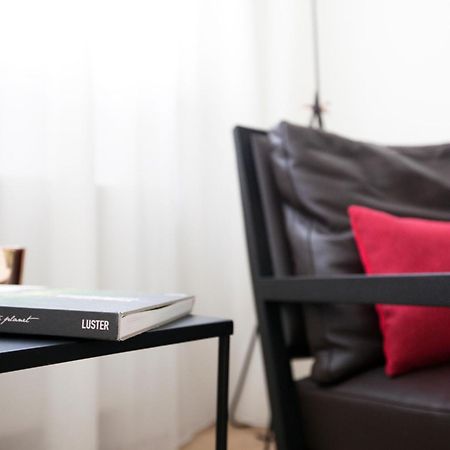 Maison Nationale City Flats & Suites แอนต์เวิร์ป ห้อง รูปภาพ The interior of the hotel