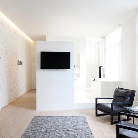 Maison Nationale City Flats & Suites แอนต์เวิร์ป ห้อง รูปภาพ A room at the hotel