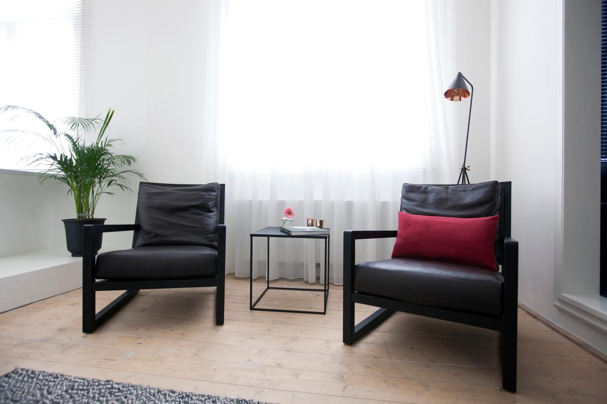 Maison Nationale City Flats & Suites แอนต์เวิร์ป ห้อง รูปภาพ Interior of a room at the hotel