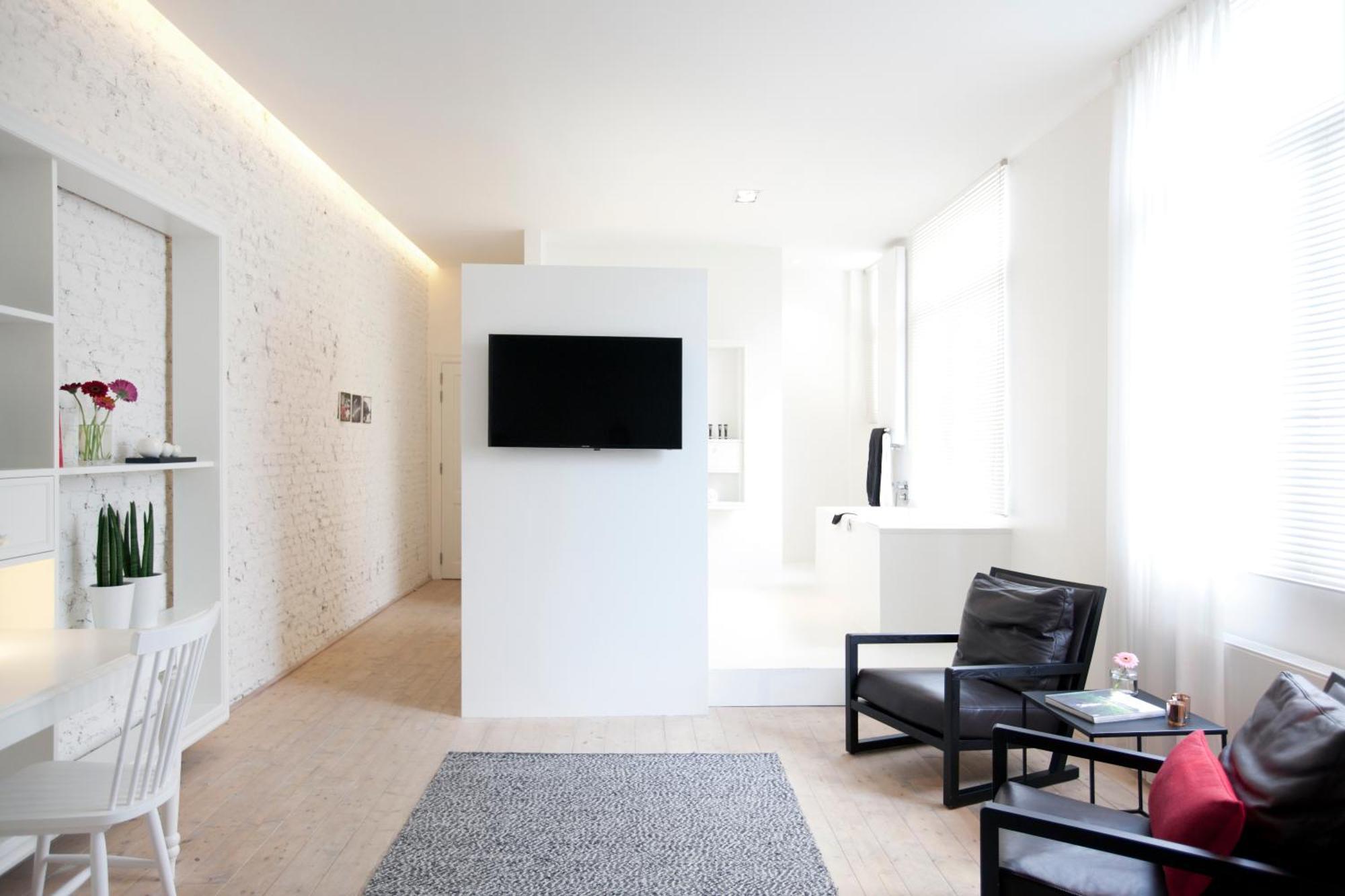 Maison Nationale City Flats & Suites แอนต์เวิร์ป ห้อง รูปภาพ A room at the hotel