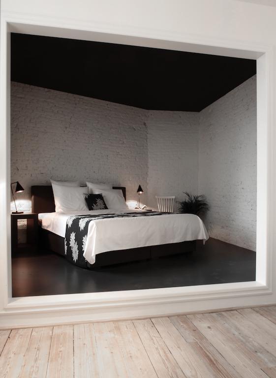 Maison Nationale City Flats & Suites แอนต์เวิร์ป ห้อง รูปภาพ A bedroom