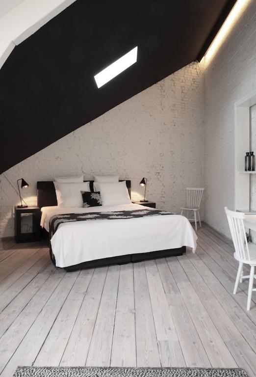 Maison Nationale City Flats & Suites แอนต์เวิร์ป ภายนอก รูปภาพ A room at the hotel