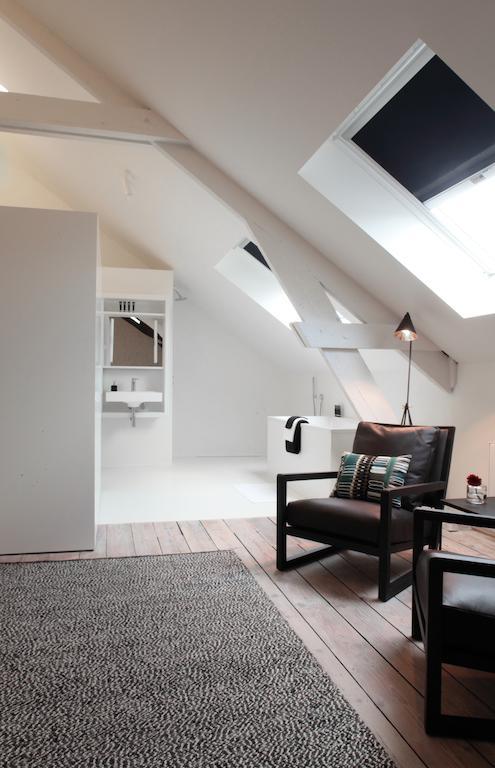 Maison Nationale City Flats & Suites แอนต์เวิร์ป ห้อง รูปภาพ A modern attic apartment