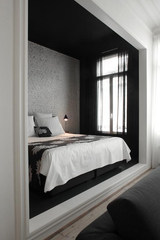 Maison Nationale City Flats & Suites แอนต์เวิร์ป ภายนอก รูปภาพ A room at the hotel
